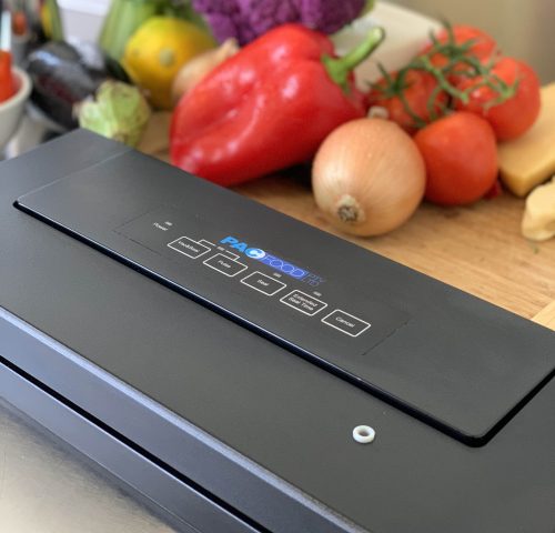 Vs105 Vacuum Sealer black Fresh Produce In Background