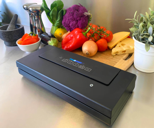 Vs105 Vacuum Sealer black Fresh Produce In Background